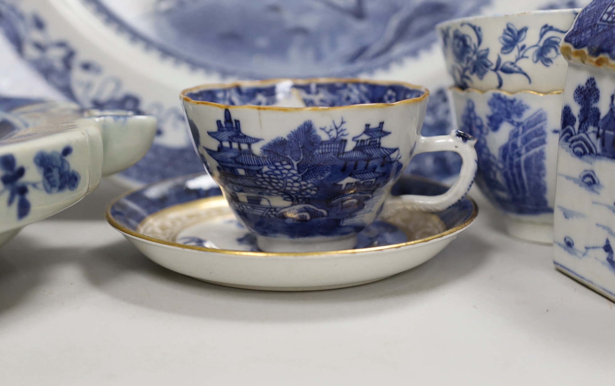 A group of English and Chinese blue and white tea and coffee wares, and a hot water dish, Chinese charger 35cms diameter